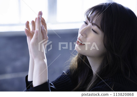 Young woman doing hand care Young woman doing hand care 113820868