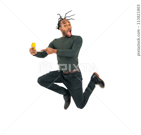Black man jumping while looking at his smartphone. Full-body photo PNG with transparent background precisely cut out by hand. Black man jumping while looking at his smartphone. Full-body photo PNG with transparent background precisely cut out by hand. 113821803