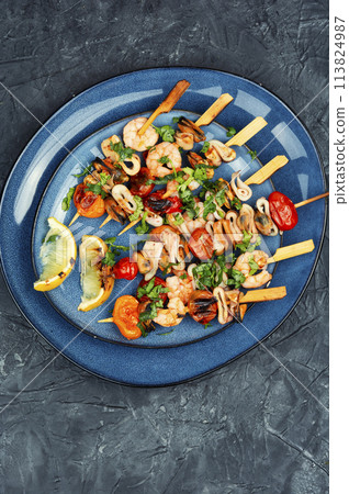 Tasty seafood kebabs, shellfish. 113824987