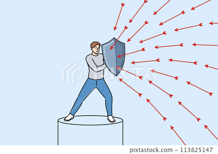 Brave man defends himself from problems using shield to deflect flying arrows from enemies 113825147