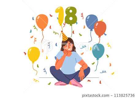 Woman celebrates 18th birthday, proud reaching adulthood, and sits on floor among candy and balloons 113825736