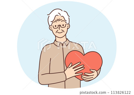 Smiling mature man hold big heart in hands 113826122