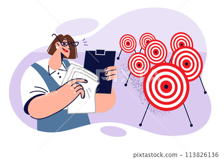 Business woman engaged in setting goals and objectives or planning, stands near many darts targets 113826136