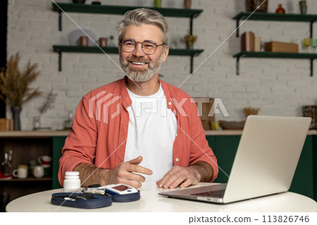Diabetic man talking with doctor online in telehealth telemedicine video call on laptop Diabetic man talking with doctor online in telehealth telemedicine video call on laptop 113826746