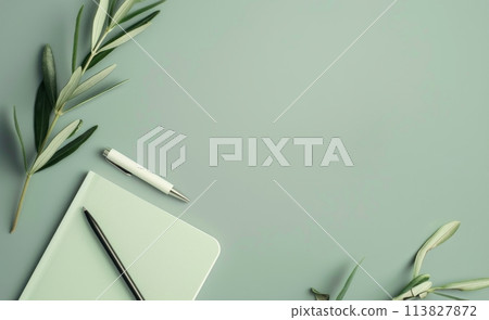 Notepad, Pen, and Leaves on Table Notepad, Pen, and Leaves on Table 113827872