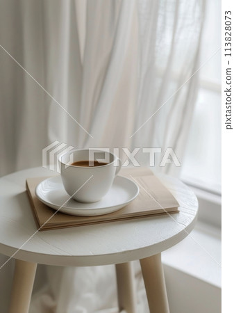 Coffee Cup and Book on Marble Table Coffee Cup and Book on Marble Table 113828073