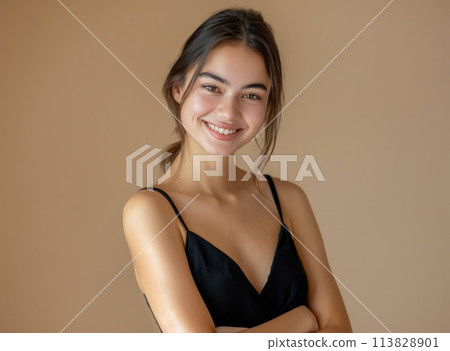 Woman in Black Dress Posing for Picture 113828901
