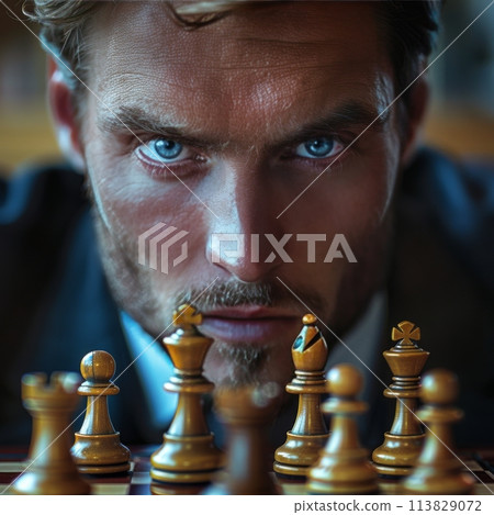 Man With Blue Eyes Playing Chess Man With Blue Eyes Playing Chess 113829072