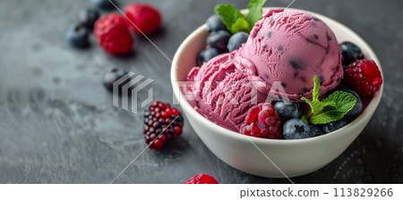 Bowl of Ice Cream With Blueberries and Raspberries 113829266