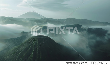 Mountain Shrouded in Fog Near Ocean 113829267