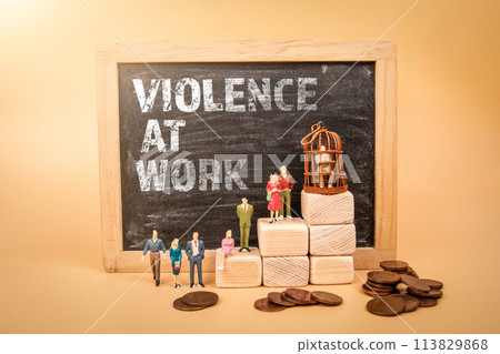 Violence At Work. Chalkboard and miniature human figures on a light background Violence At Work. Chalkboard and miniature human figures on a light background 113829868
