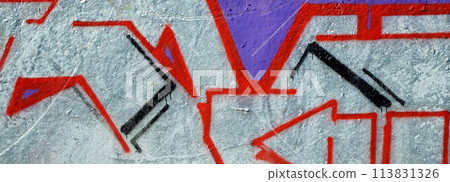Colorful background of graffiti painting artwork with bright aerosol outlines on wall. Old school street art piece made with aerosol spray paint cans. Contemporary youth culture backdrop 113831326