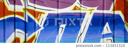 Colorful background of graffiti painting artwork with bright aerosol outlines on wall. Old school street art piece made with aerosol spray paint cans. Contemporary youth culture backdrop Colorful background of graffiti painting artwork with bright aerosol outlines on wall. Old school street art piece made with aerosol spray paint cans. Contemporary youth culture backdrop 113831328