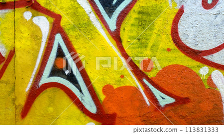 Colorful background of graffiti painting artwork with bright aerosol outlines on wall. Old school street art piece made with aerosol spray paint cans. Contemporary youth culture backdrop Colorful background of graffiti painting artwork with bright aerosol outlines on wall. Old school street art piece made with aerosol spray paint cans. Contemporary youth culture backdrop 113831333
