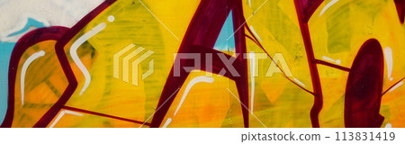 Colorful background of graffiti painting artwork with bright aerosol outlines on wall. Old school street art piece made with aerosol spray paint cans. Contemporary youth culture backdrop 113831419