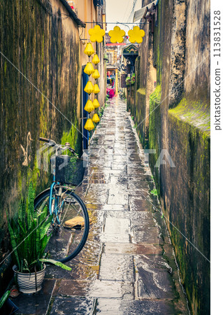 Rainy day in the Old Town of Hoi An Rainy day in the Old Town of Hoi An 113831528