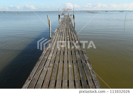 Bana Wooden Bridge is a wooden bridge built with the cooperation of the community. Built to stretch all the way to Pattani Bay, you can take a walk to admire the atmosphere of the sea. Bana Wooden Bridge is a wooden bridge built with the cooperation of the community. Built to stretch all the way to Pattani Bay, you can take a walk to admire the atmosphere of the sea. 113832026