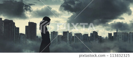Silhouette of a woman walking alone in an apocalyptic world 113832325