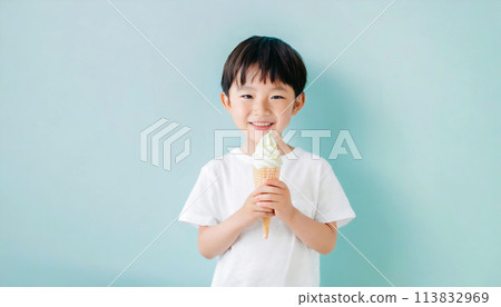 Boy holding soft serve ice cream / smiling, happy, having fun 113832969