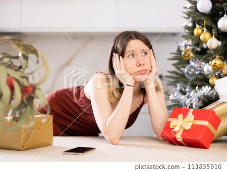 Portrait of a frustrated young woman at home Portrait of a frustrated young woman at home 113835910