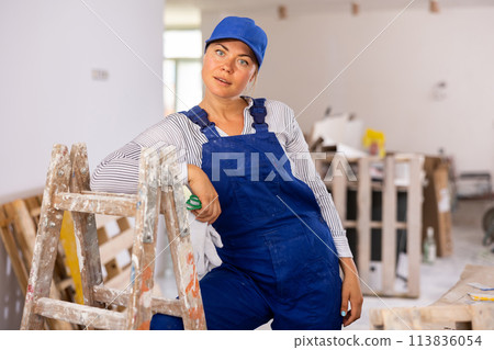 Portrait of a young woman engineer in uniform Portrait of a young woman engineer in uniform 113836054