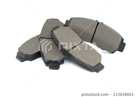 New auto brake pads isolated on white background 113836601