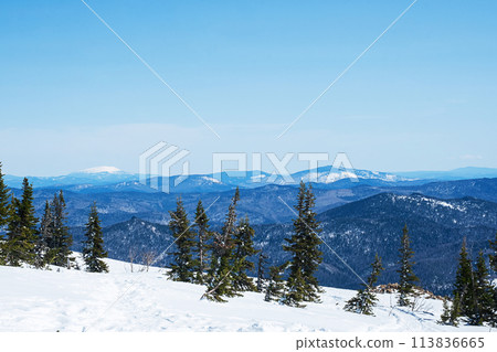 Snow covered wintry mountain landscape. 113836665