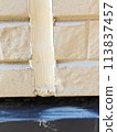 Poorly applied caulking during exterior wall painting [insufficient removal] 113837457