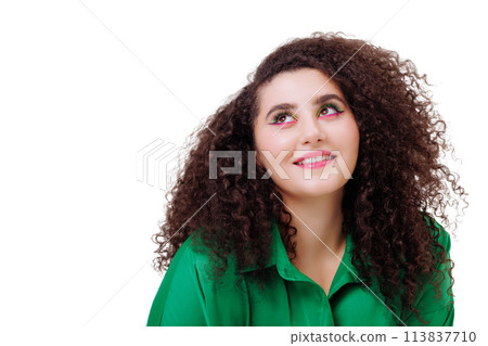 A woman with green clothing and green hair poses for a picture A woman with green clothing and green hair poses for a picture 113837710
