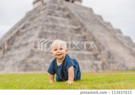 Baby traveler, tourists observing the old pyramid and temple of the castle of the Mayan architecture known as Chichen Itza these are the ruins of this ancient pre-columbian civilization and part of Baby traveler, tourists observing the old pyramid and temple of the castle of the Mayan architecture known as Chichen Itza these are the ruins of this ancient pre-columbian civilization and part of 113837815