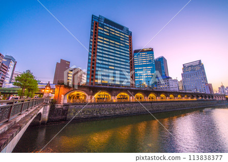 Tokyo cityscape in Japan - Night view of Manseibashi Bridge, Marche Écout, Kanda River, trains, etc. (Right background is Ochanomizu Station) Tokyo cityscape in Japan - Night view of Manseibashi Bridge, Marche Écout, Kanda River, trains, etc. (Right background is Ochanomizu Station) 113838377