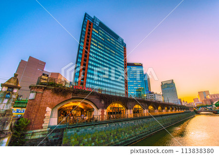 Tokyo cityscape in Japan - View of Marche Ecute and Kanda River from Manseibashi Bridge - night view (towards Ochanomizu Station in the back right) Tokyo cityscape in Japan - View of Marche Ecute and Kanda River from Manseibashi Bridge - night view (towards Ochanomizu Station in the back right) 113838380