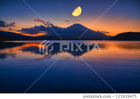 Moon composite rising to the summit of Mt. Fuji 113839475