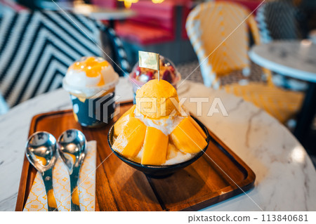 Mango ice cream in a cup at a seaside cafe 113840681