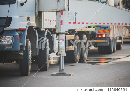 Mobile Crane Track On Construction Site: Deploying Hydraulic Leg Support. Mobile Crane Track On Construction Site: Deploying Hydraulic Leg Support. 113840864
