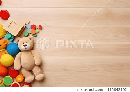 AI generated Top view of kids toys frame on wooden background with copy space. AI generated Top view of kids toys frame on wooden background with copy space. 113842102