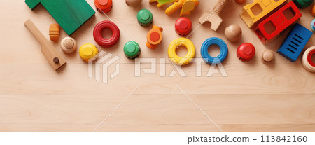 AI generated Top view of kids toys frame on wooden background with copy space. AI generated Top view of kids toys frame on wooden background with copy space. 113842160