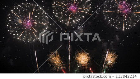 Golden Firework celebrate anniversary happy new year 2024, 4th of july holiday festival. Gold firework in the night time celebrate national holiday. Countdown to new year 2023 gold party time event Golden Firework celebrate anniversary happy new year 2024, 4th of july holiday festival. Gold firework in the night time celebrate national holiday. Countdown to new year 2023 gold party time event 113842214