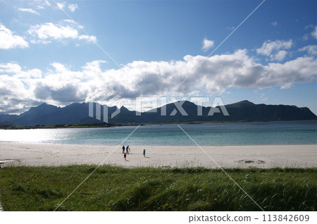 Coast of Norway sea in clouds of haze. Cloudy Nordic day on Lofoten islands Coast of Norway sea in clouds of haze. Cloudy Nordic day on Lofoten islands 113842609