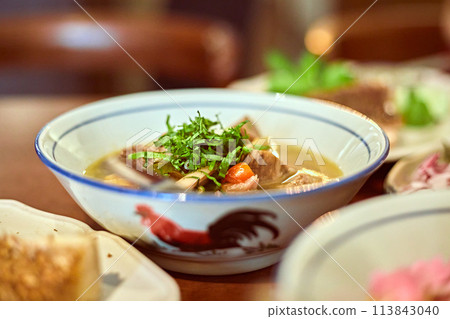 Beef in herbs broth 113843040