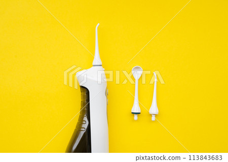 Mouth aerator on a yellow background with different nozzles. View from above Mouth aerator on a yellow background with different nozzles. View from above 113843683