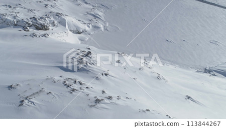 Antarctica Winter Snow Mountain Aerial View. Cold Beautiful Ice Covered Nature Landscape Scenery. Arctic Sunny Morning Drone Flight Top Down 113844267