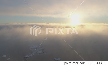 Antarctica Sunset Ocean Surface Fog Aerial View. Cloud Sky at Arctic Coast Glacier Panorama. Polar Orange Sunrise over Panoramic Antarctic Nature Atmosphere Drone Flight 113844336