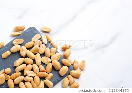 Salty buttery peanuts perfect for alcoholic snacks Salty buttery peanuts perfect for alcoholic snacks 113844373