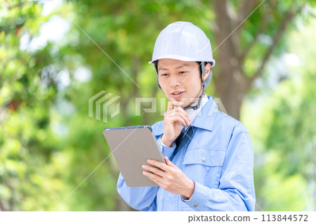 Male portrait in helmet work clothes Male portrait in helmet work clothes 113844572