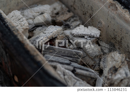 Burning charcoal Burning charcoal 113846231
