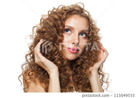 Cheerful woman face. Young model with healthy skin, long hair and makeup on white background Cheerful woman face. Young model with healthy skin, long hair and makeup on white background 113849533