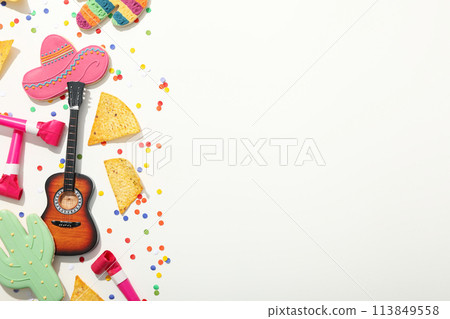 Cinco de Mayo celebration concept, nachos with decorations Cinco de Mayo celebration concept, nachos with decorations 113849558