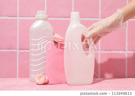 Detergents with flowers on a pink background 113849613