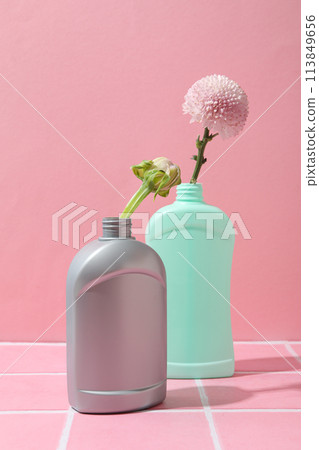 Detergents with flowers on a pink background 113849656